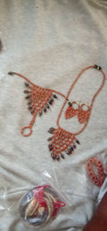 Triangle pattern necklace and earring set.